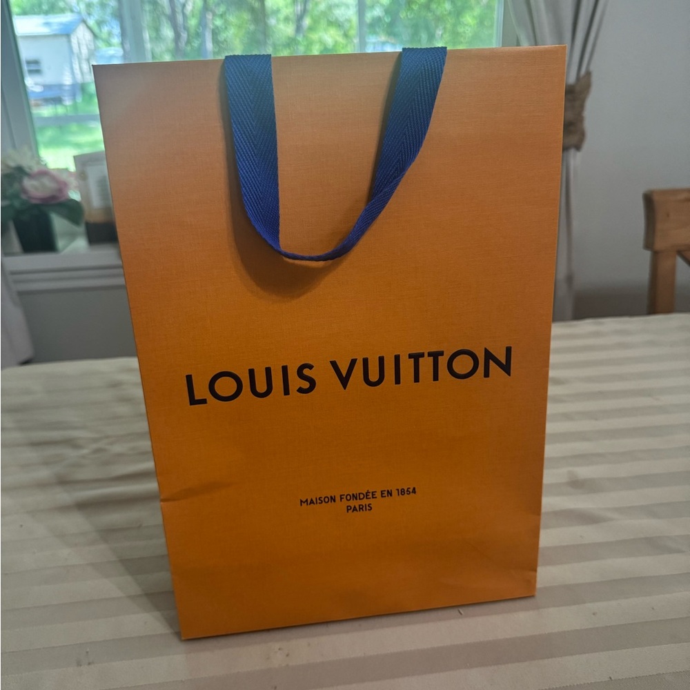 Louis Vuitton Vibrant Orange Bag with Blue Handles